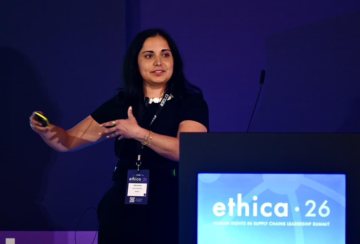 A speaker presenting on stage at ethica26, last year's summit